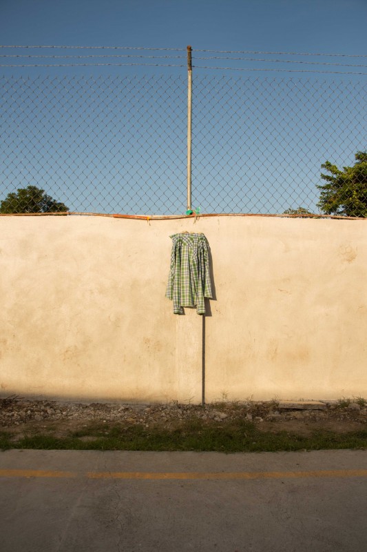 A migrant's shirt hung to dry at Albergue La 72 in Tenosique, Tabasco. Photo by Gabriela Bortolamedi.