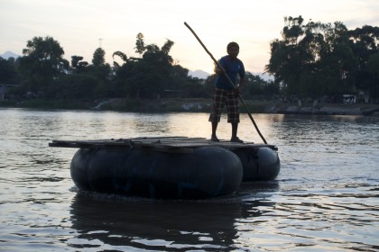 A man aboard a raft on the river. Río Suchaite. Photo by Diana Taylor. 