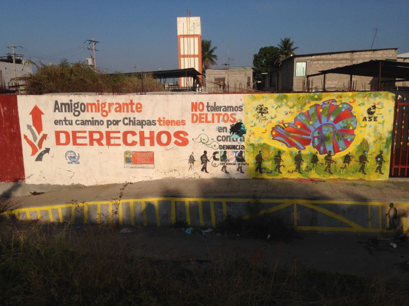 A graffiti sign on the Mexican side of the River Suchiate, facing migrants as they go across